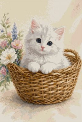 A White Kitten in a Basket